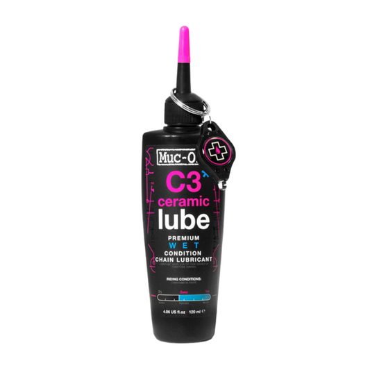 Muc-Off C3 Ceramic Wet Weather chain lube fluid bottle one hundred and twenty milliliter home workshop sizing showing ergonomic black container precision application tip green graphics detailing boron nitride ceramic components visual UV light indicator and premium product packaging - Epic Sports Kenya