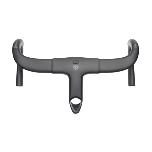 MOST Talon Ultra Fast integrated carbon handlebar showing one piece wing shaped aero top section compact drop profiles matte black carbon finish internal TiCR cable routing ports underside accessory mounting holes and pristine white branding text - Epic Sports Kenya