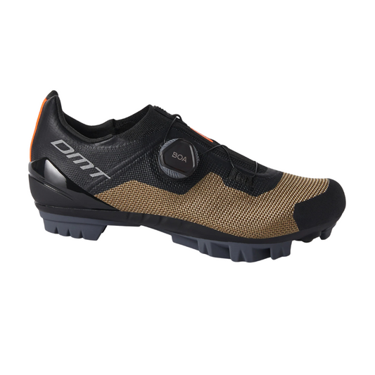 DMT KM4 hybrid engineered knit mountain bike and gravel shoes in black and bronze showing single BOA L6 dial and high traction bi component composite outsole profile - Epic Sports Kenya