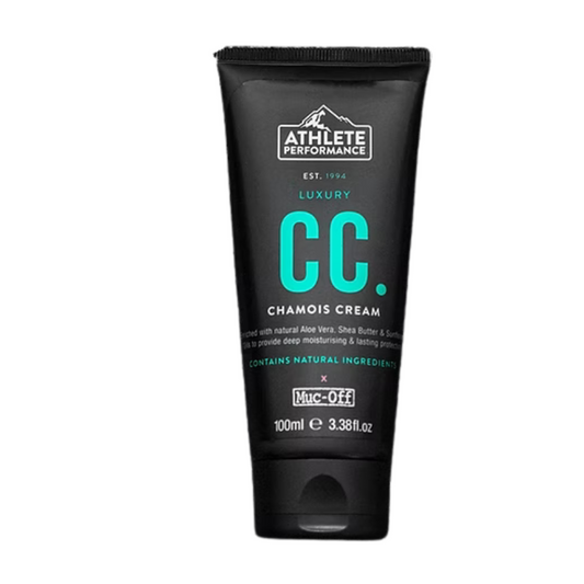 Muc-Off Athlete Performance Luxury Chamois Cream round plastic tub container displaying bold black pink and white branding text detailing natural antibacterial provitamin anti friction cycling skin protection formula - Epic Sports Kenya
