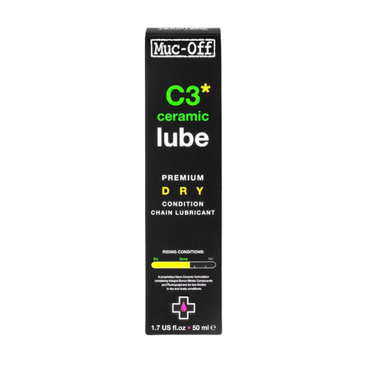 Muc-Off C3 Ceramic Dry Weather chain lube fluid bottle compact portable fifty milliliter sizing showing ergonomic black container precision application tip purple graphics detailing boron nitride ceramic components visual UV light indicator and premium product packaging - Epic Sports Kenya