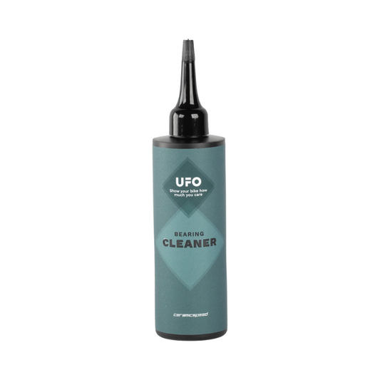 CeramicSpeed UFO bearing cleaner hundred milliliter white workshop dropper bottle showing fast evaporating residue free solvent formula text instructions precision tip applicator and dark cap for premium bottom bracket and hub ceramic bearing overhaul - Epic Sports Kenya