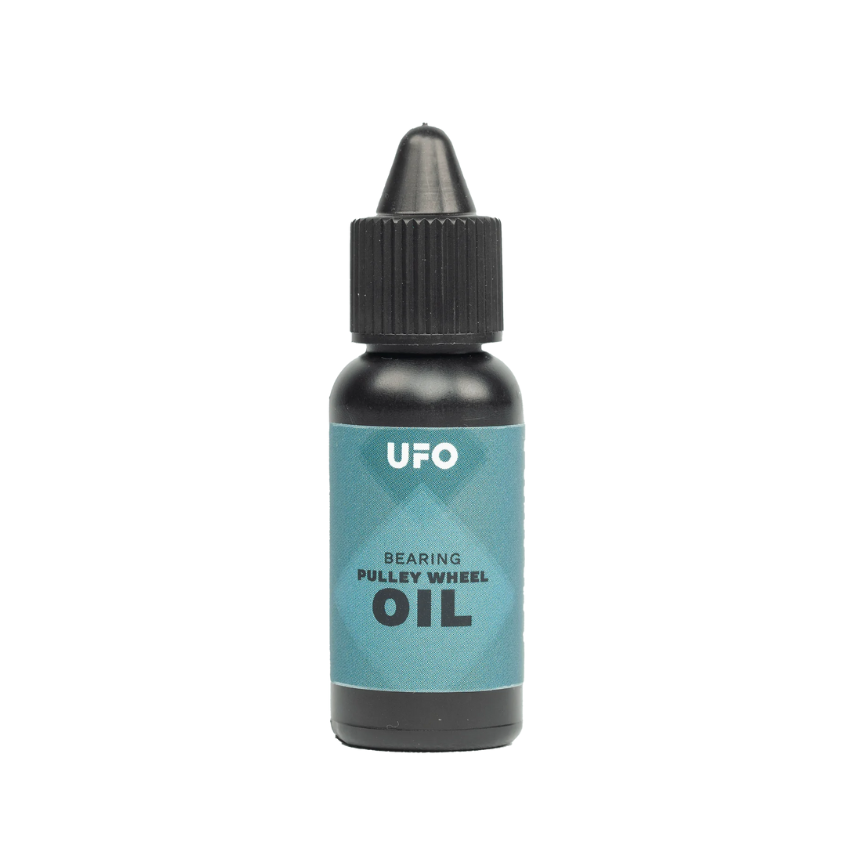 CeramicSpeed UFO bearing oil for derailleur pulley wheels fifteen milliliter small dropper bottle showing premium ultra low viscosity formula precision application tip clean branding text and dark cap for ospw maintenance - Epic Sports Kenya